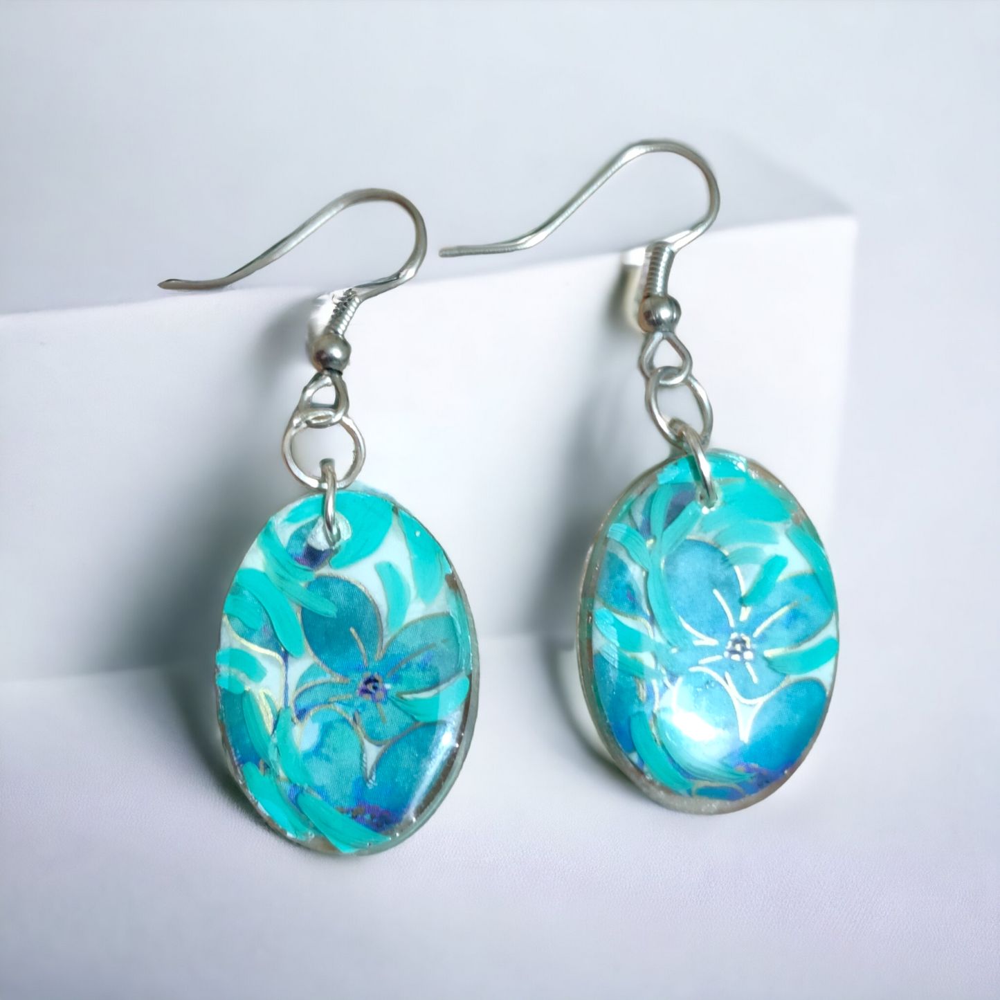 Teal Blossom: Hand-Painted Oval UV Resin Earrings