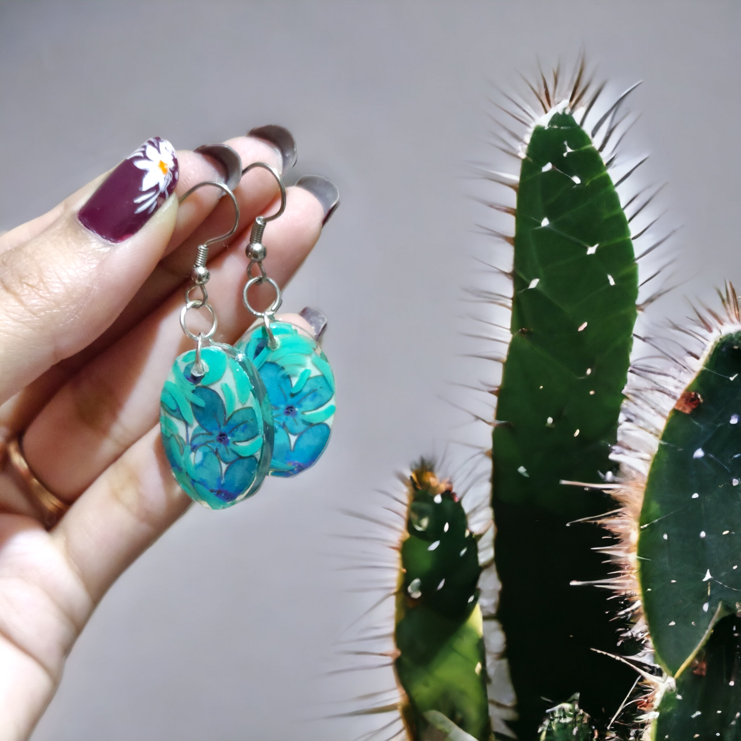 Teal Blossom: Hand-Painted Oval UV Resin Earrings