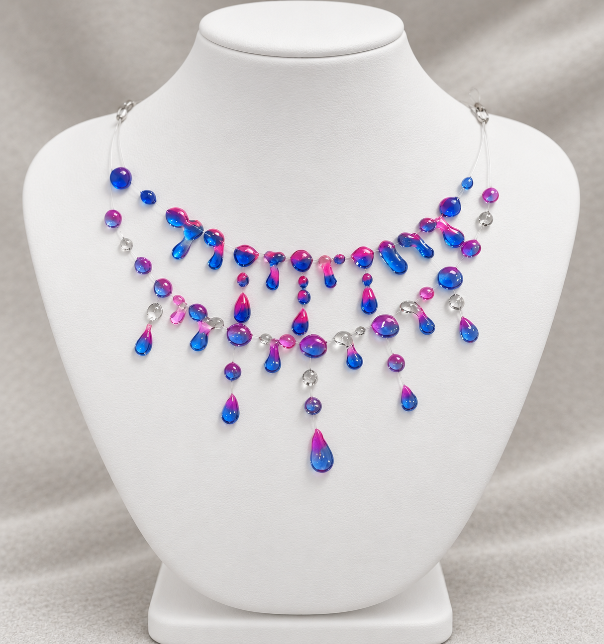 Handcrafted Design: Unique, multi-layered resin drops