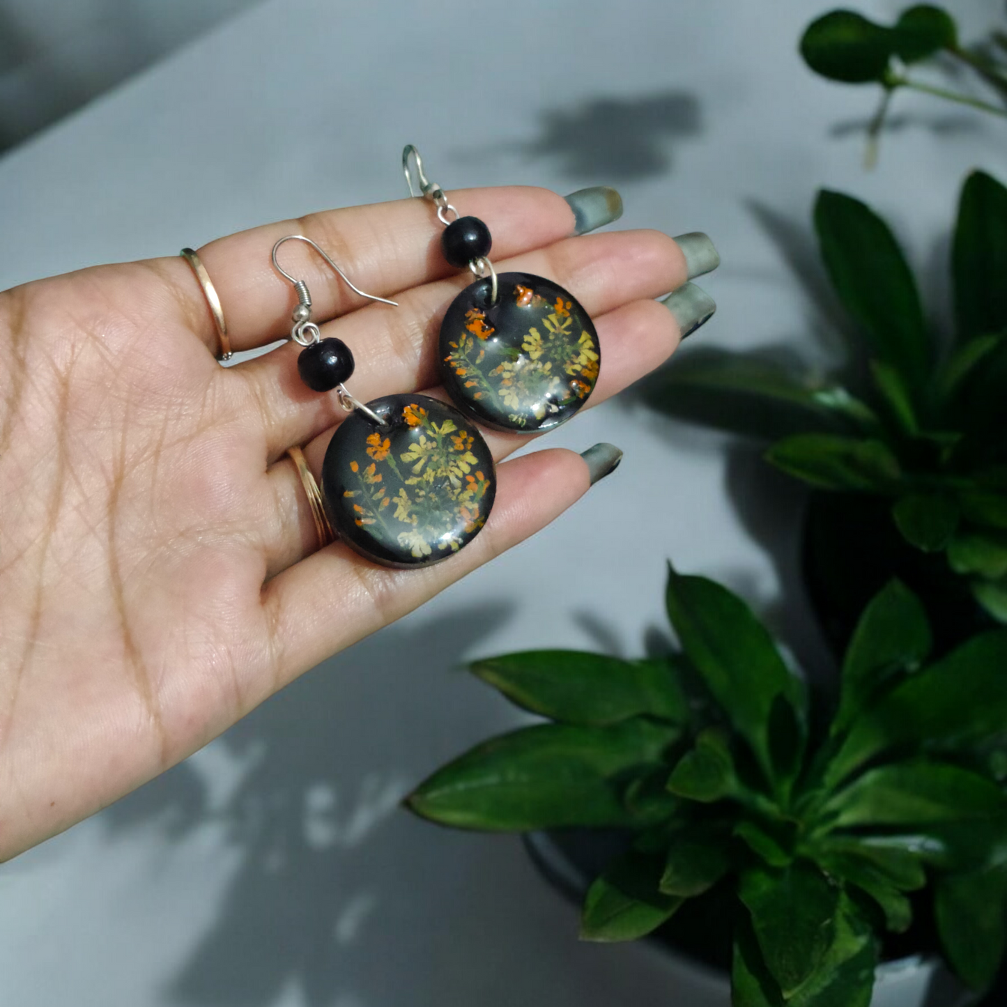 Midnight Meadow: Black Disk UV Resin Wildflower Earrings